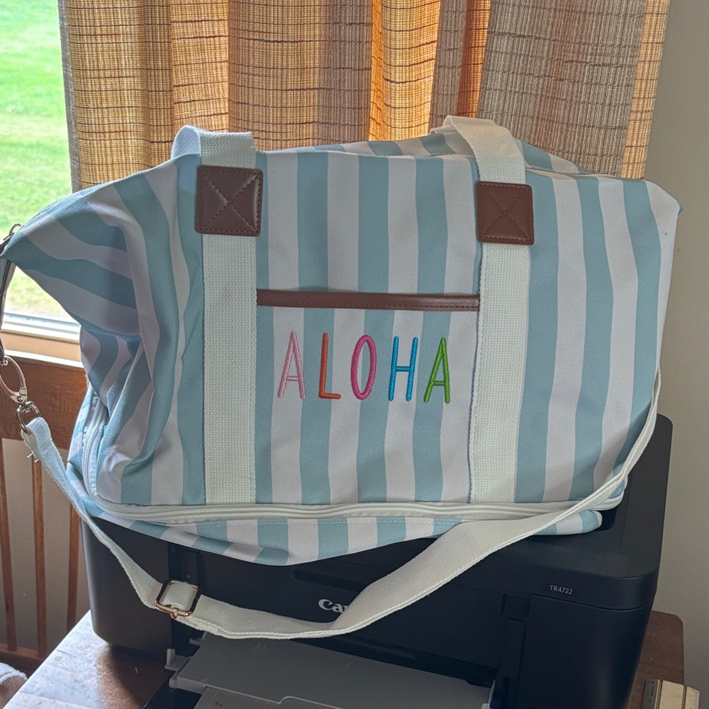 Golden sun weekender bag